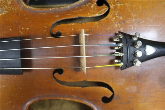 A mandolin and a cased violin